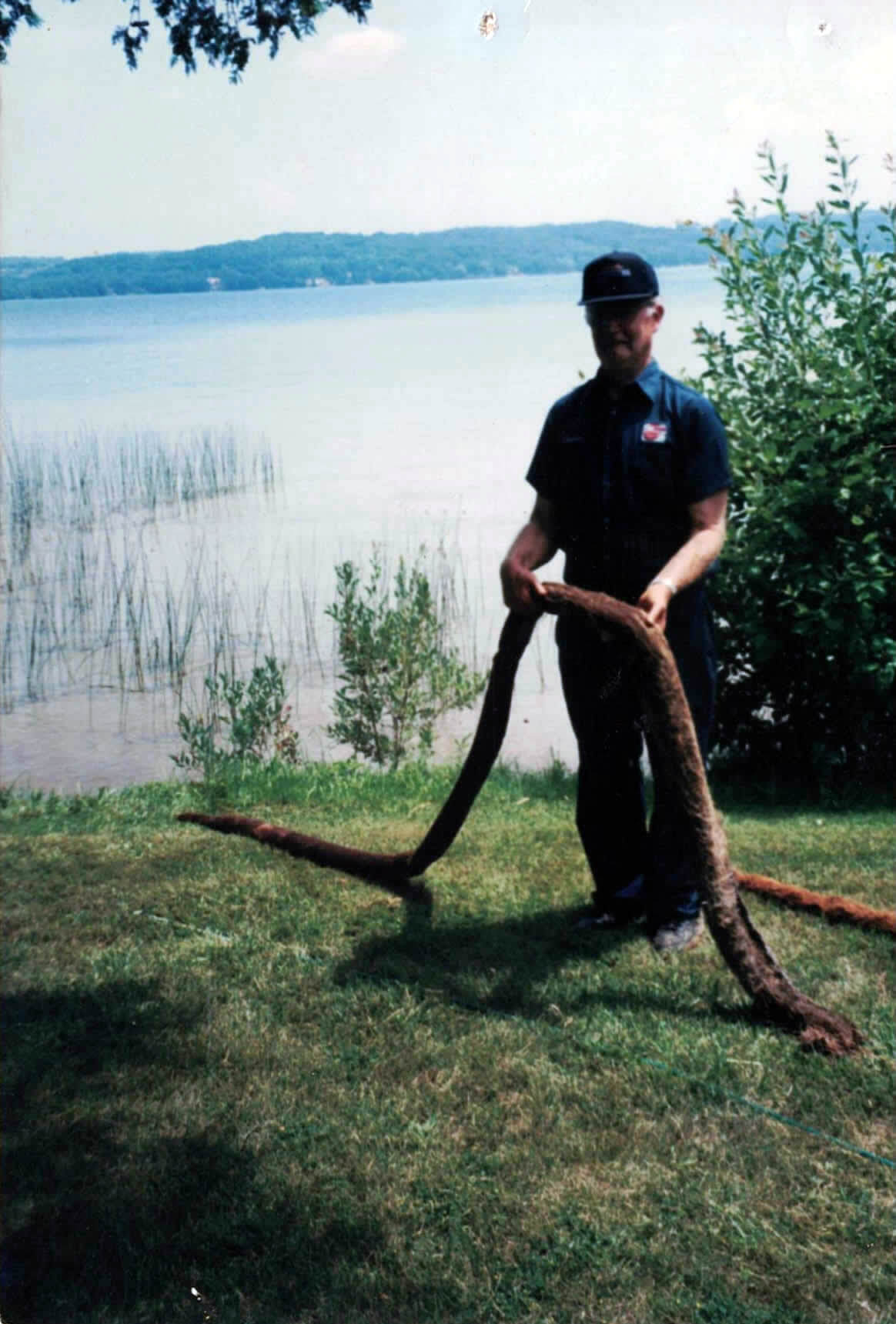 Elmer J Pulling out a 15ft root snake